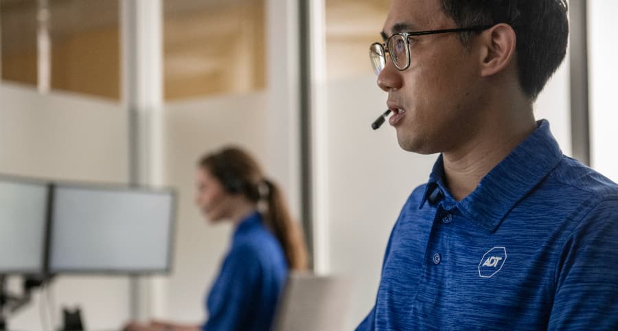 ADT team member in a monitoring center